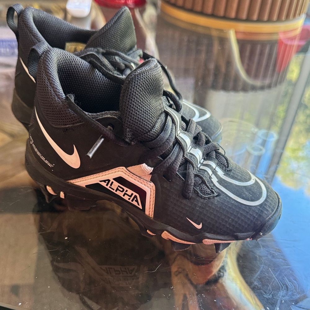 Nike Alpha Black and White Sports Cleats